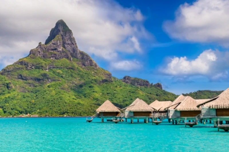 Tropical paradise with overwater bungalows.
