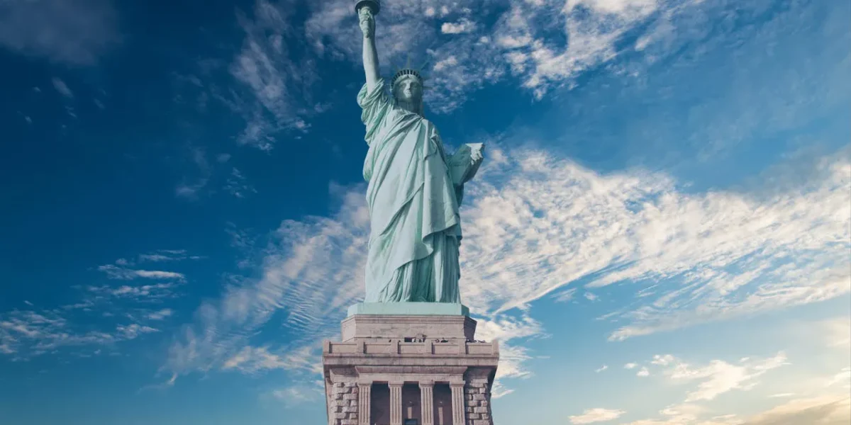 Statue of Liberty against blue sky